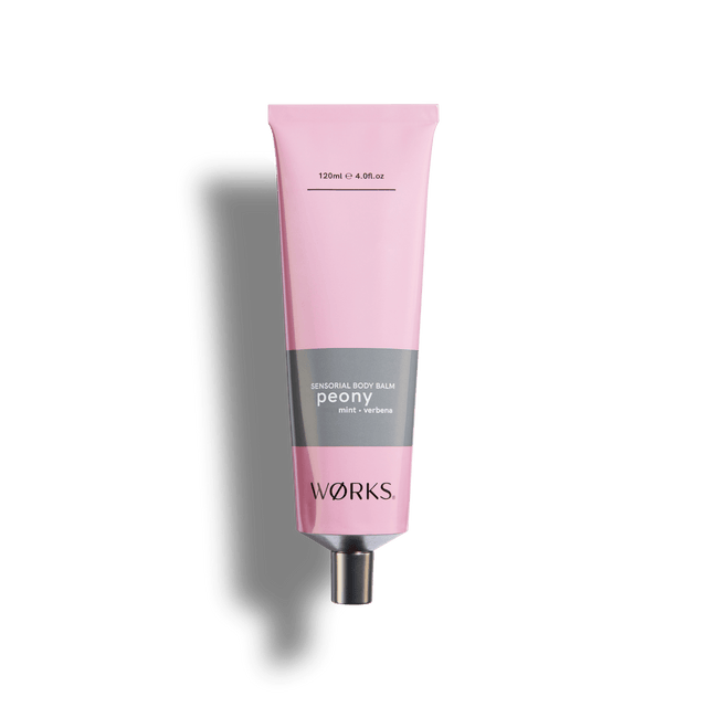 Peony 120ml body balm tube in WØRKS signature packaging, photographed on a clean white background