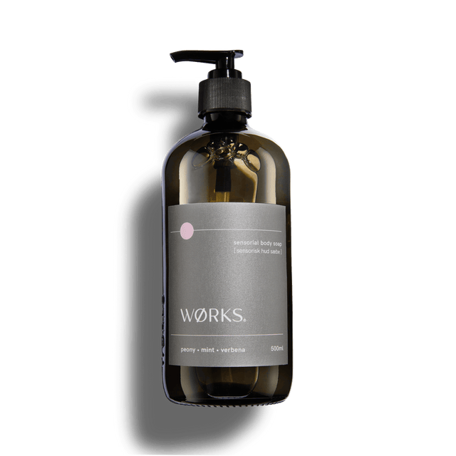 Peony 500ml body soap in WØRKS signature packaging, photographed on a clean white background