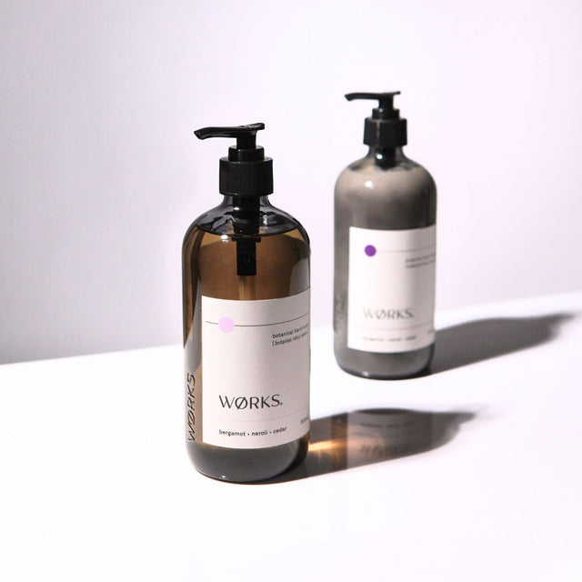 Bergamot Hand Care Duo — 500ml soap and cream styled in ambient light