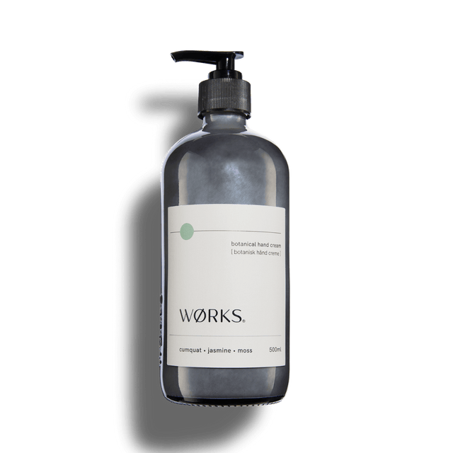 Cumquat 500ml hand cream in WØRKS signature packaging, photographed on a clean white background