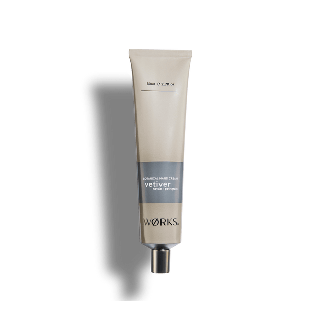 Vetiver 80ml hand cream tube in WØRKS signature packaging, photographed on a clean white background