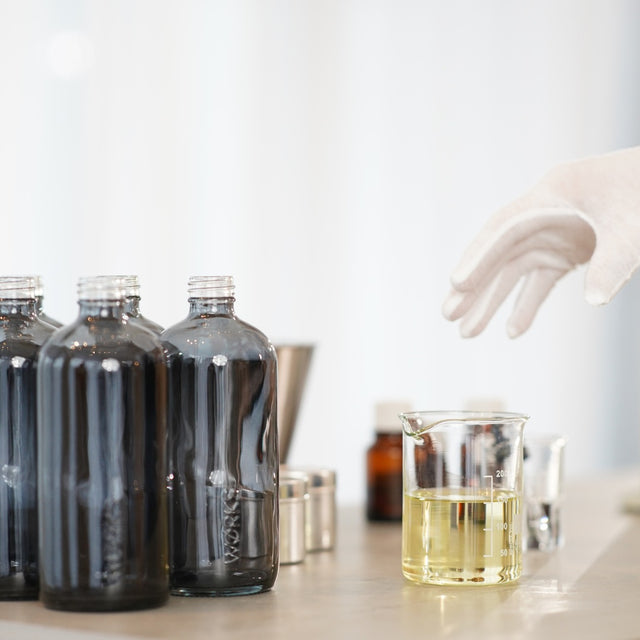 WØRKS small-batch production — bottles being hand-filled in the Melbourne studio.