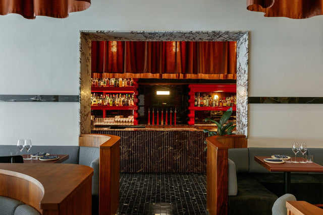 The Fugazzi dining room on Leigh Street, Adelaide, with a red bar and velvet curtains