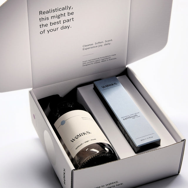 WØRKS Saltbush Gift Box open, showing Botanical Wash and Botanical Hand Cream inside FSC-certified packaging