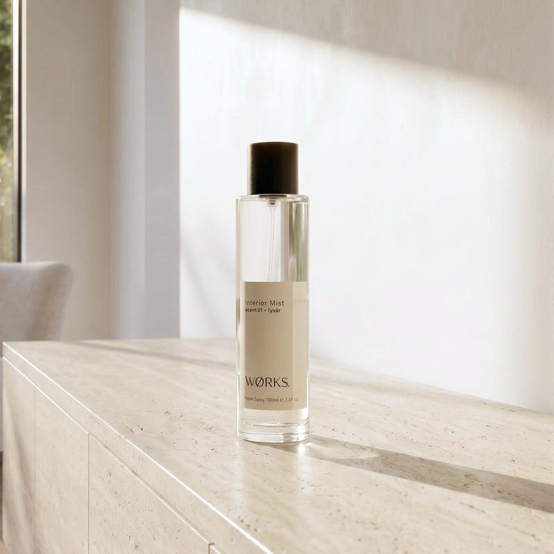 WØRKS Interior Mist 100ml product shot — botanical home fragrance in smoky glass bottle, Melbourne