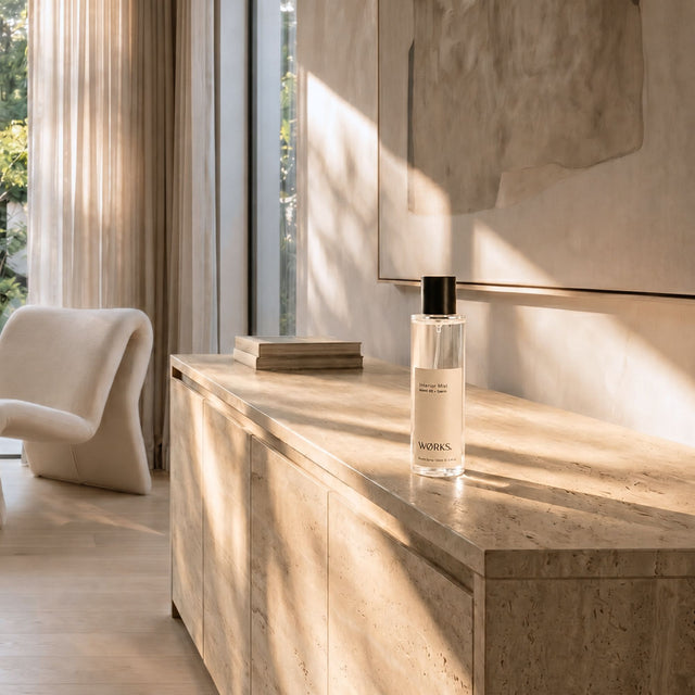 WØRKS Interior Mist Fjærn 100ml styled in situ — botanical room and linen spray in smoky glass bottle