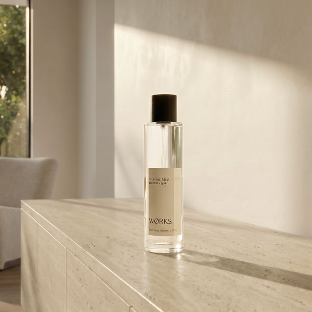 WØRKS Interior Mist Lysår 100ml styled in situ — botanical room and linen spray in smoky glass bottle