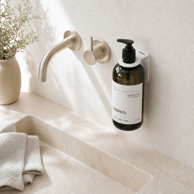 WØRKS Wall Bracket in white styled in situ, mounted on a tiled wall