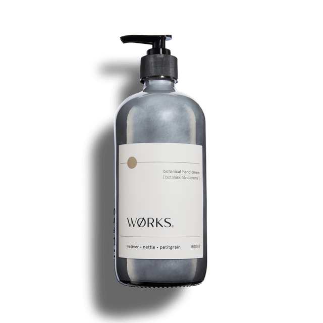 Vetiver 500ml hand cream in WØRKS signature packaging, photographed on a clean white background