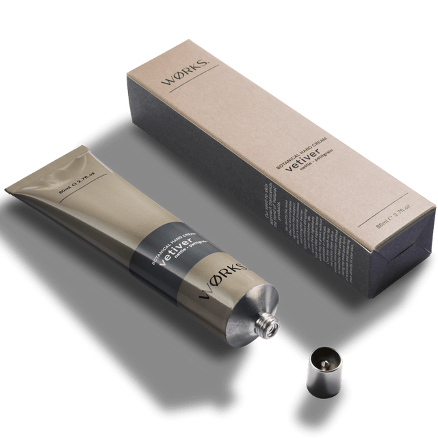 Vetiver 80ml hand cream tube with minimal design and luxurious texture, captured in soft natural light