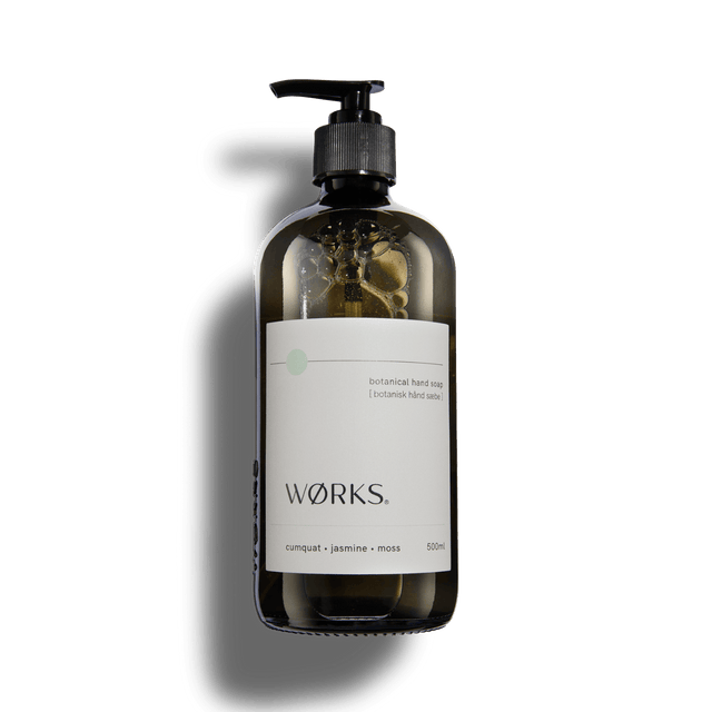 Cumquat 500ml hand soap in WØRKS signature packaging, photographed on a clean white background